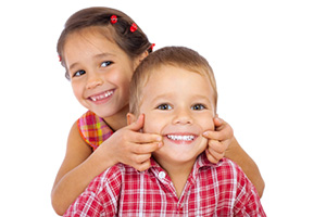 two kids smiling