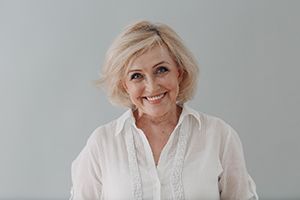 Woman smiling with dentures