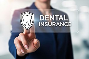 Person touching dental insurance graphic
