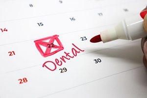 Dental appointment marked in red on calendar
