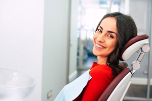 Female patient in red shirt ready for treatment