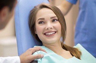 Smiling woman in dental chair