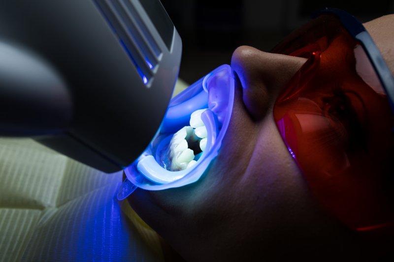 person having yellow teeth whitened 